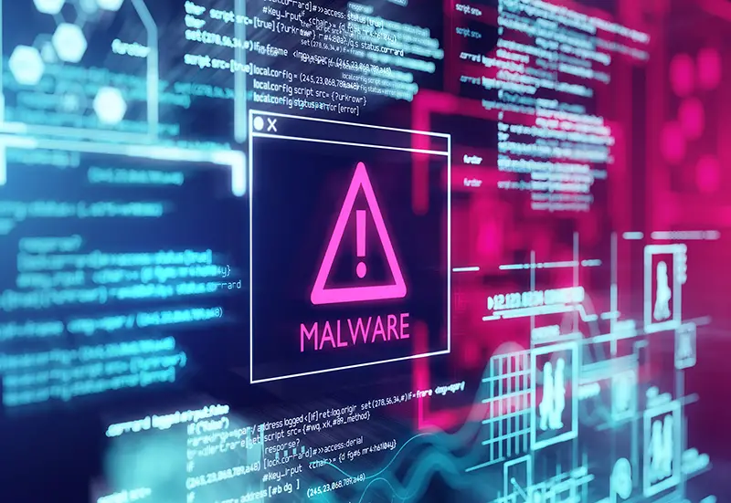A computer screen with program code warning of a detected malware script 