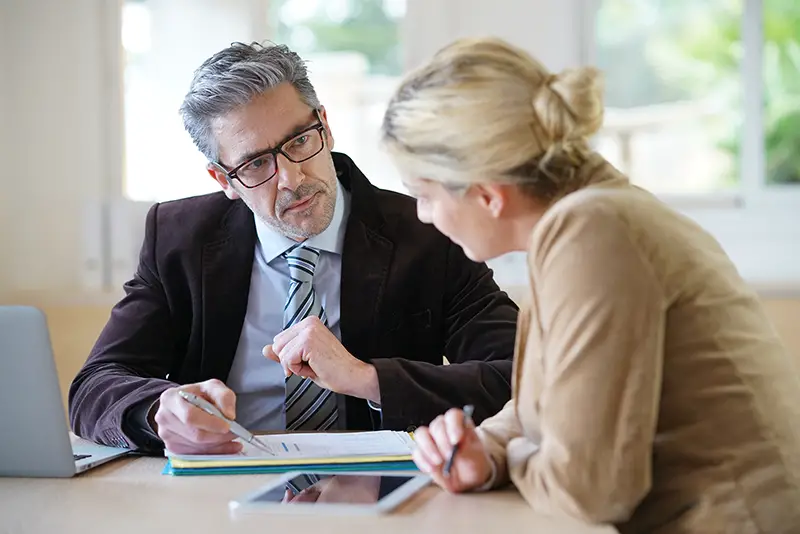 Woman meeting notary for advice