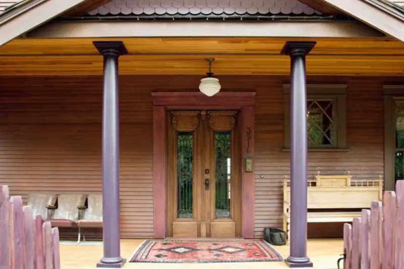 Front door of a modern house made of wood
