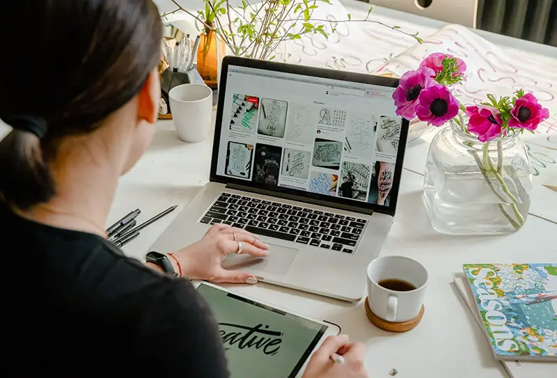 Woman using her laptop at home