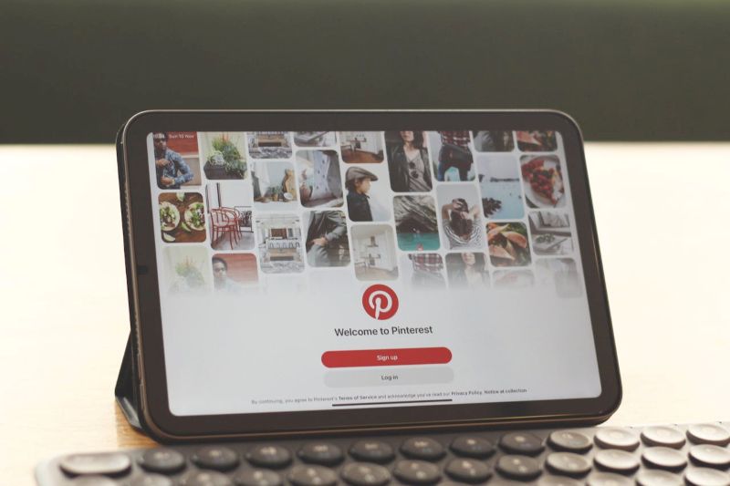 Digital Tablet Displaying Pinterest on Desk