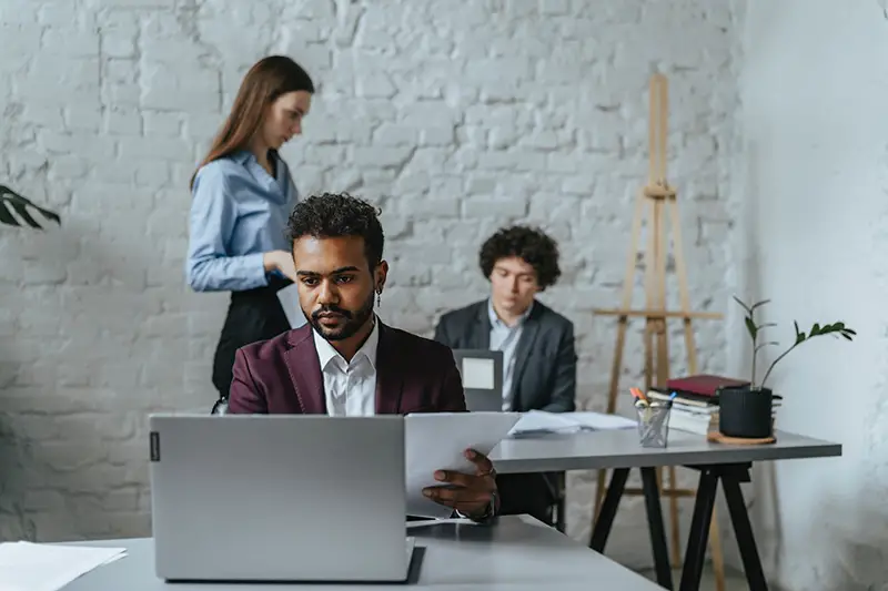 Man using laptop while working