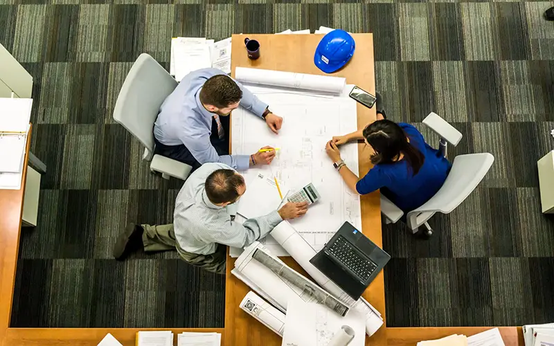 Top view of people working in a project