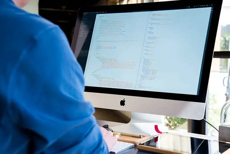 Man working in front of his computer