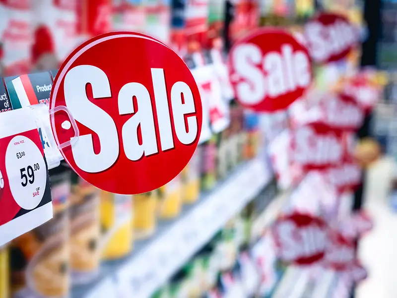 Sale Promotion Discount sign on Supermarket shelf 