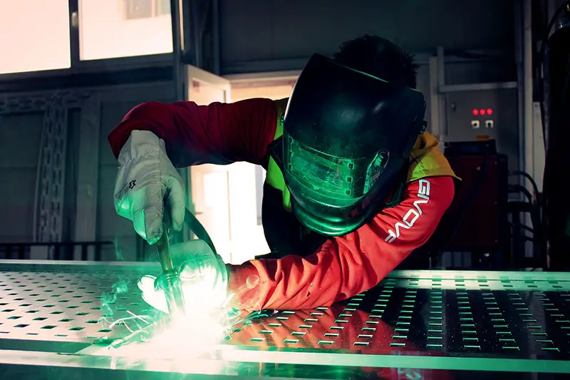 Man working as a welder