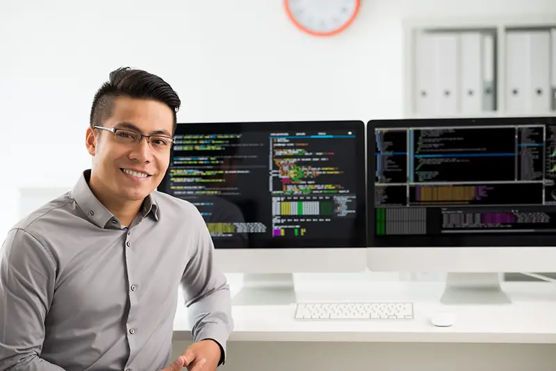 Smiling young man software developer