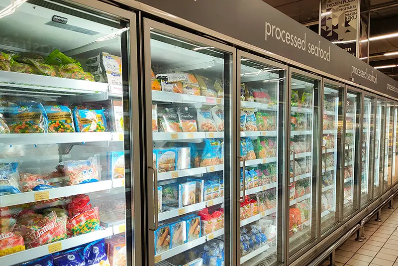 Pastries and frozen food in a commercial freezer