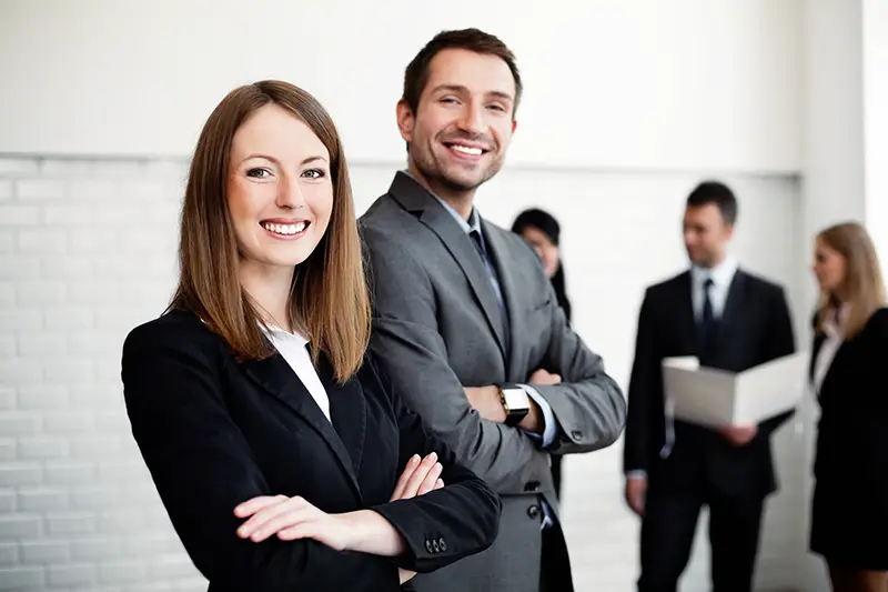 business people with female leader in foreground