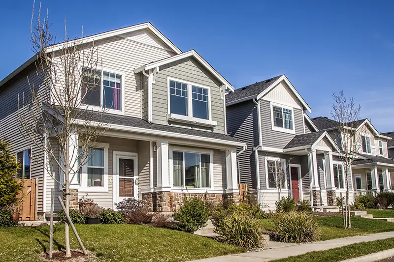 A row of new townhouses or condominiums.