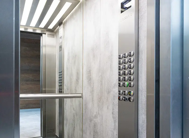 Elevator on the background of the walls with a loft-style design