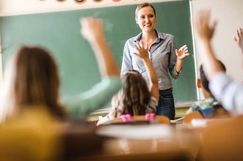 Female teacher inside the classroom