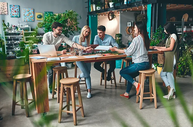 Group of young business people are working together in modern office.