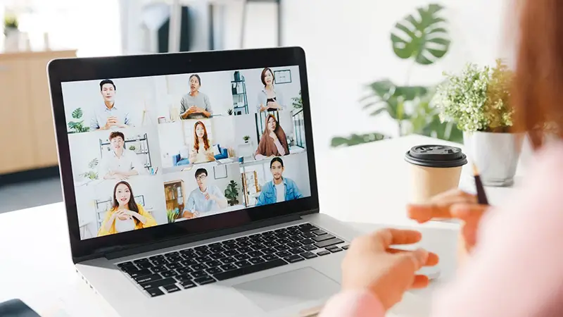 Woman on virtual conference with teams
