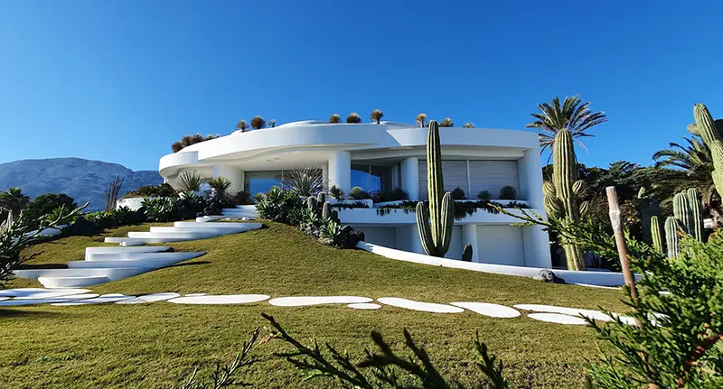 White concrete building and modern landscape design during daytime