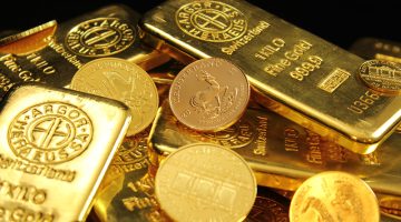 Gold bar and gold coins