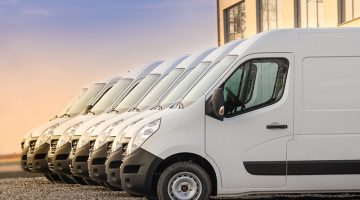 commercial delivery vans parked in row