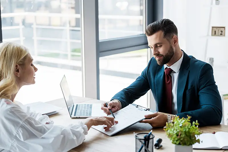 Male recuiter interviewing female applicant