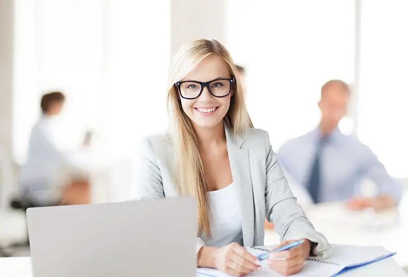 Businesswoman with documents in office