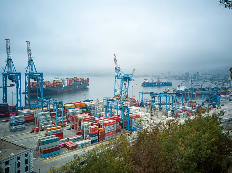 Blue and red cargo ship during daytime