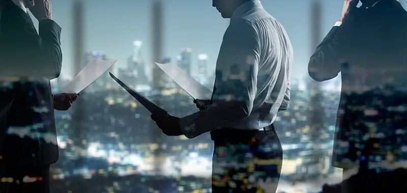 businessman with paper documents on hands