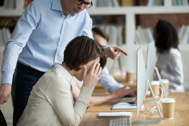 Stressed employee intern suffering from gender discrimination