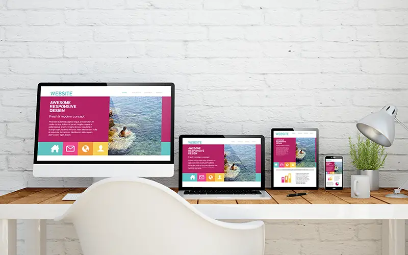multidevice desktop with fresh design website on screens.