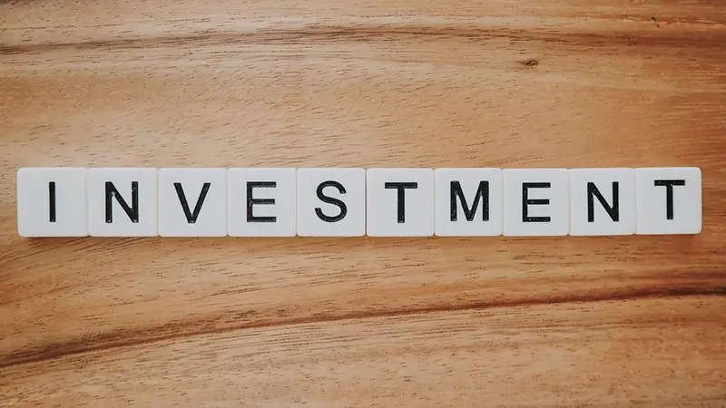Investment text on word scrabble