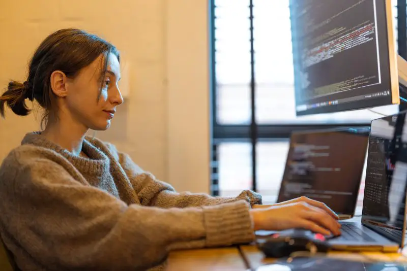 Female programmer works from home