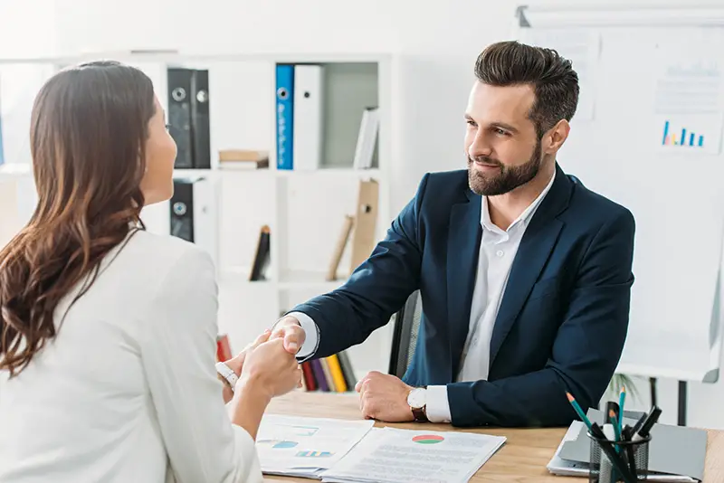 Female client and male financial advisor