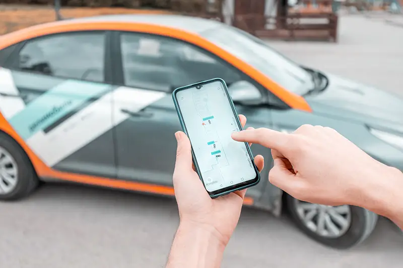 young person on a smartphone books a car i