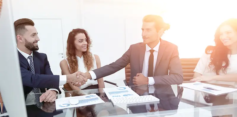 Business people shaking hands