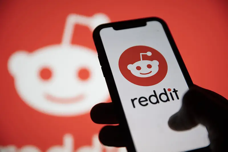 Reddit logo displayed on a smartphone device.