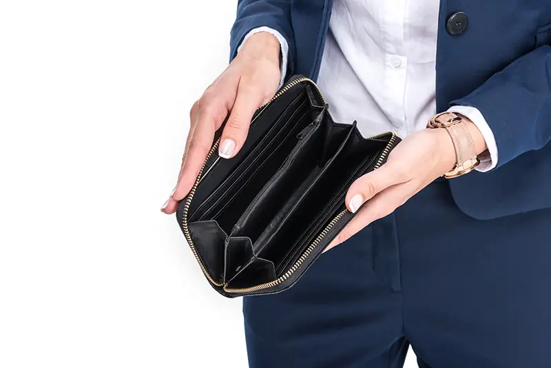 Businesswoman with empty wallet