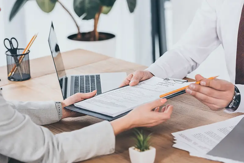 Businessman signing an insurance contract