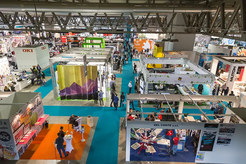 Top view of booths and people in an exhibiton