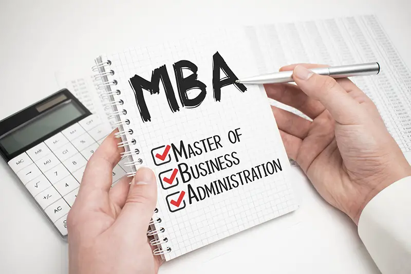 MBA Master of Business Administration written in notebook on the white background
