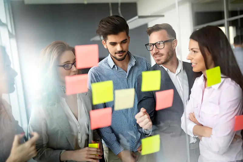 Business people planning strategy in modern office together