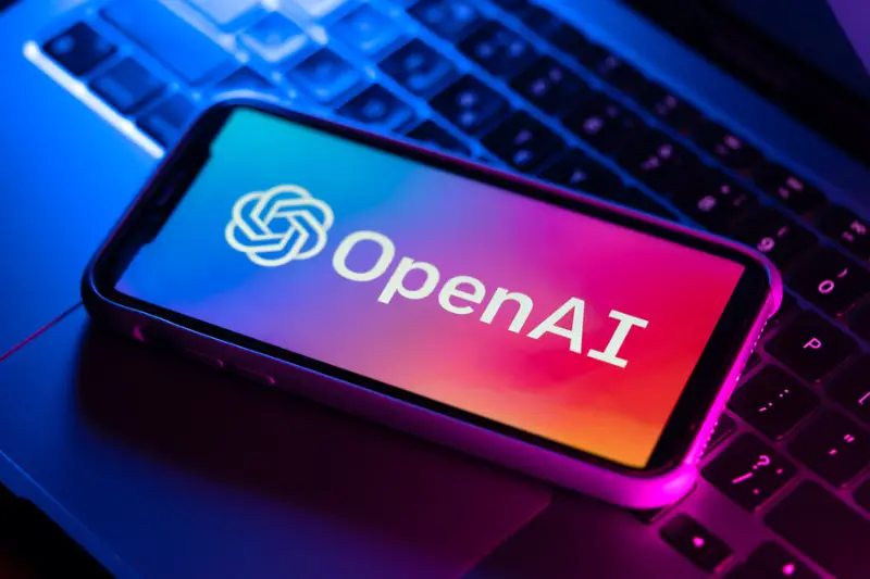 Illustrative editorial of OpenAI logo on smartphone