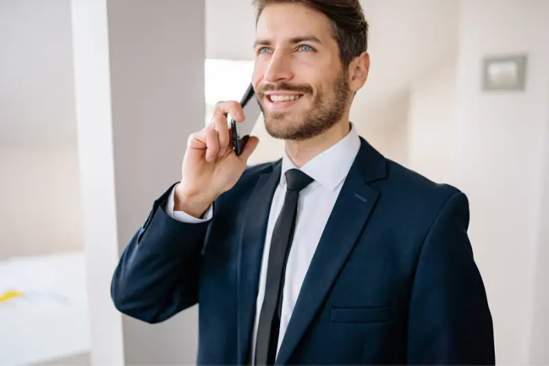 Businesssman talking to his phone