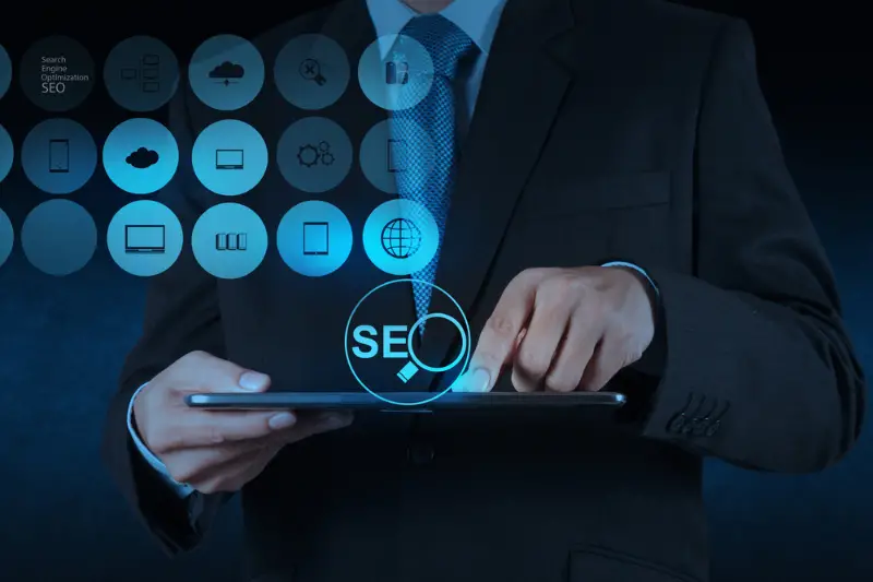 Businessman hand showing search engine optimization SEO