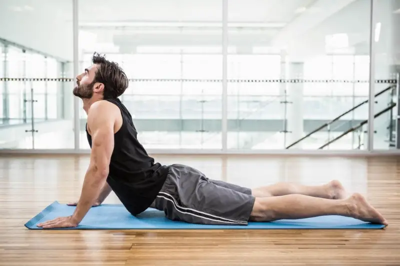 Man doing a Pilates training