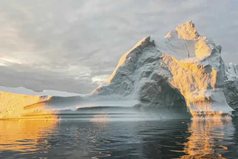 Open water surrounding iceberg