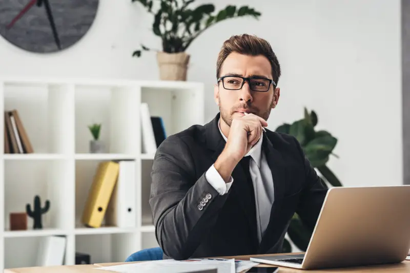 Thoughtful businessman at workplace