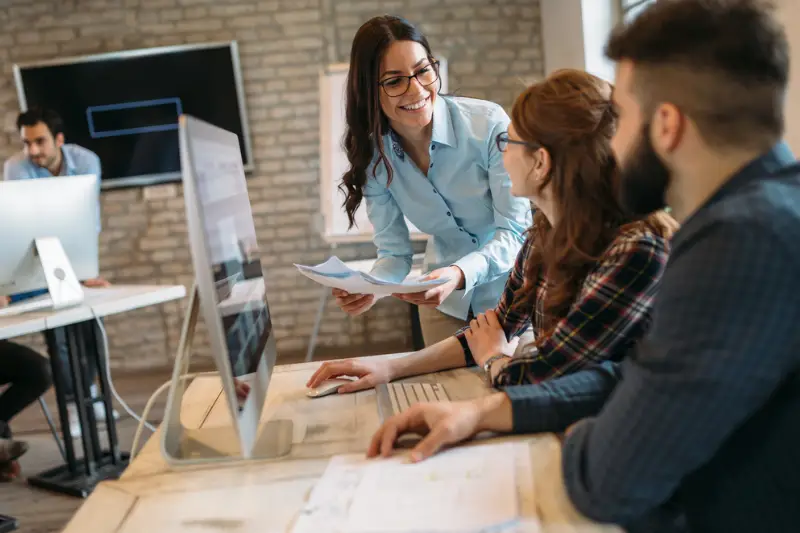 Company employees working in office