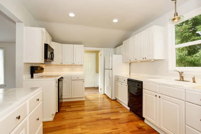 White empty simple old kitchen interior