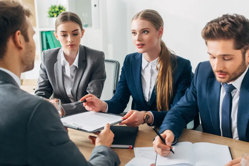 Selective focus of recruiter talking to employee