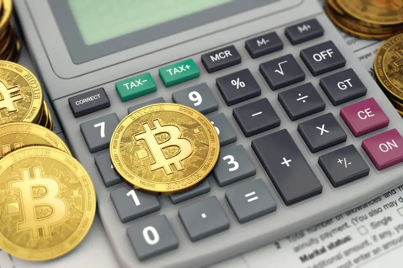 Calculator, documents and bitcoins.