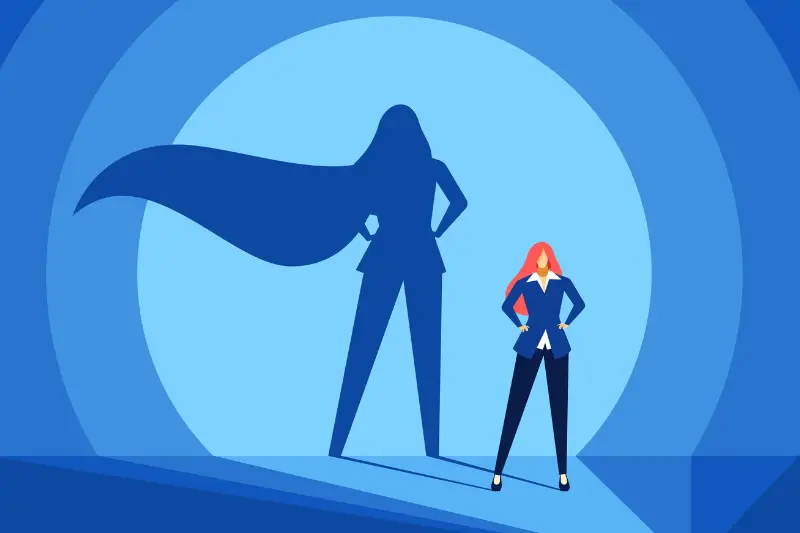 Businesswoman with superhero shadow. Strong, confident and successful business woman.
