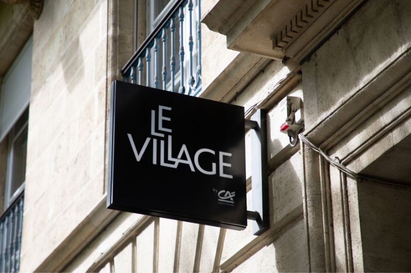 Le village by ca bank logo brand and text sign
